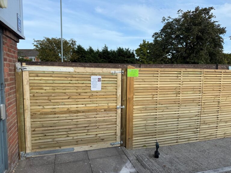 Double slatted panels with a hand made gate Christchurch