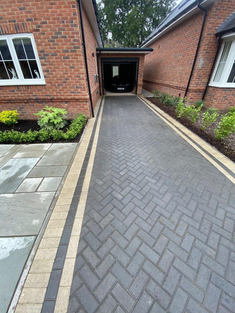 Indian sandstone paving new lawns, raised beds done for a lady in Barton on sea 5