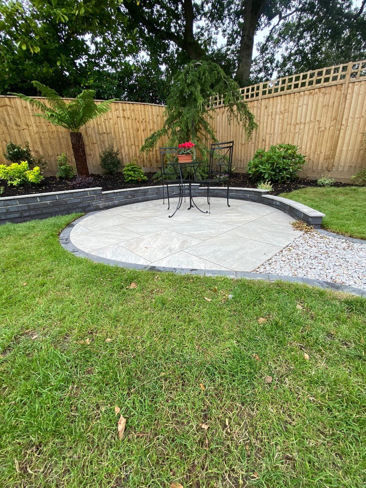 Indian sandstone paving new lawns, raised beds done for a lady in Barton on sea 6