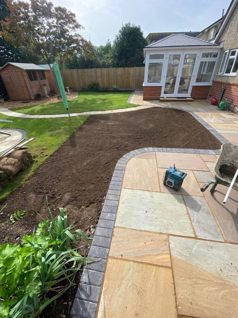 New sandstone paving, new lawns and flower beds in Walkford