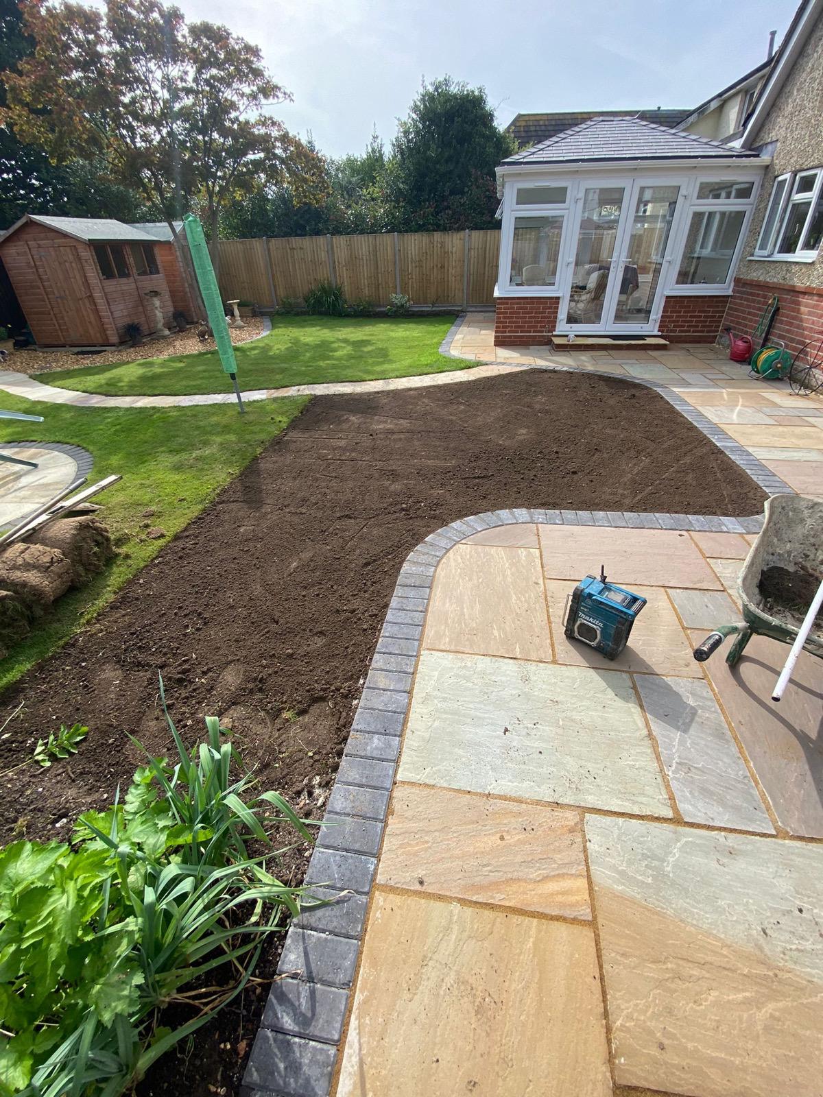 New sandstone paving, new lawns and flower beds in Walkford